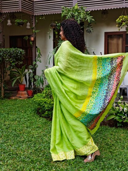 Calyz Green Linen Saree with Collage Technique